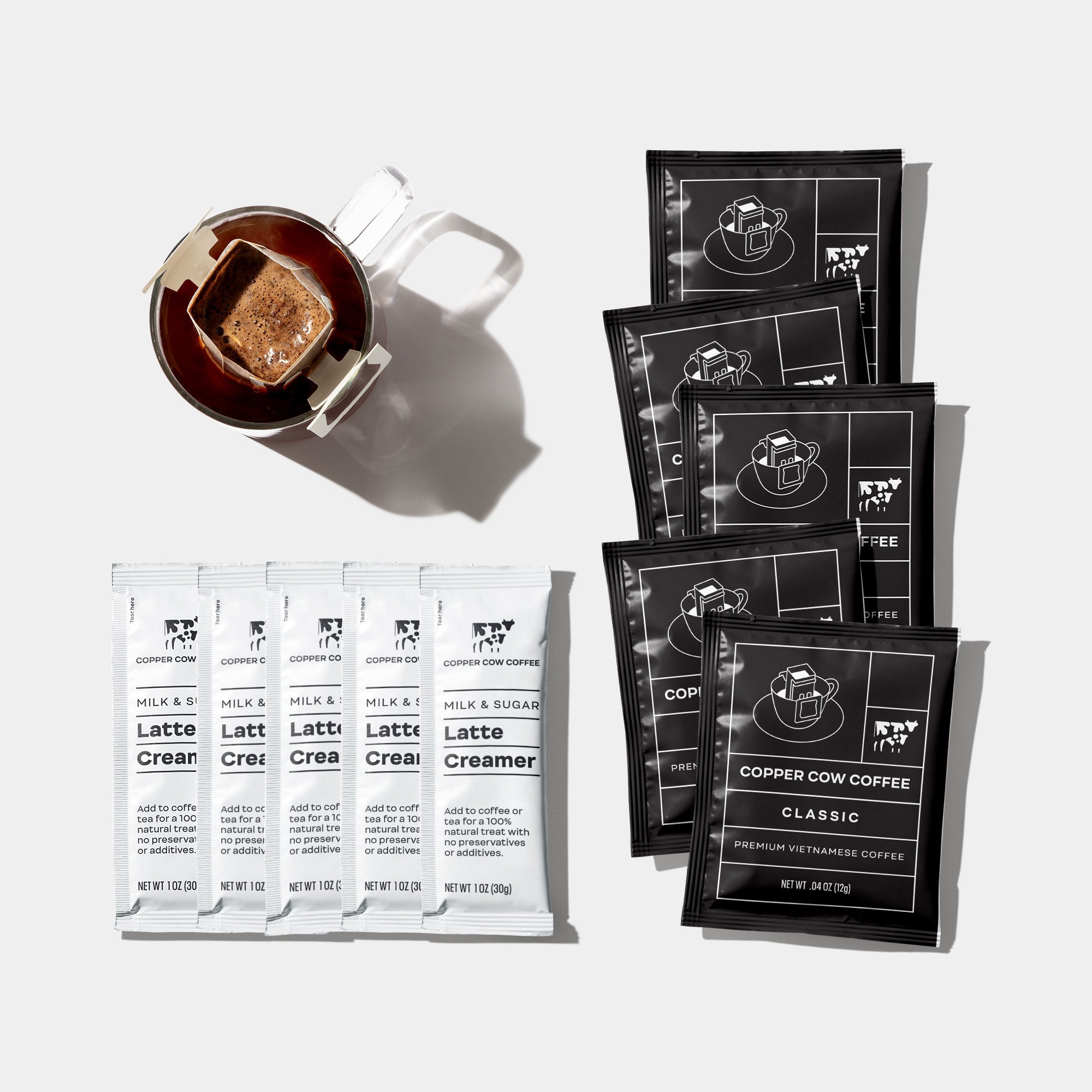 https://www.curatedbycanal.com/cdn/shop/products/K-MCREAM-5-classic-black-vietnamese-latte-creamer-box-contents-copper-cow-coffee_21da2534-6c22-4409-9cac-f958f4352311.jpg?v=1675728218